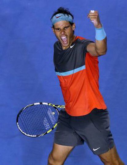 Nadal celebra su victoria contra Federer.
