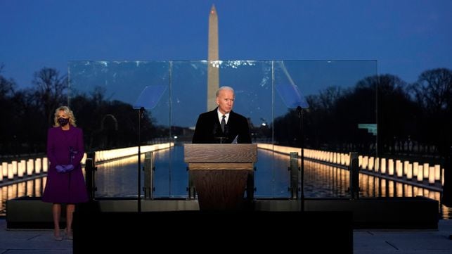 President-elect Joe Biden speaks during a COVID-19 memorial, with lights placed around the Lincoln Memorial Reflecting Pool, Tuesday, Jan. 19, 2021, in Washington. (AP Photo/Alex Brandon)