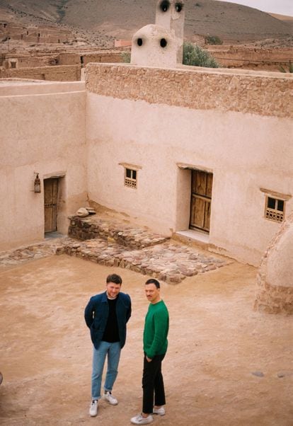 Karl Fournier and Olivier Marty pose for ICON Design in the courtyard of their desert home in Agafay.