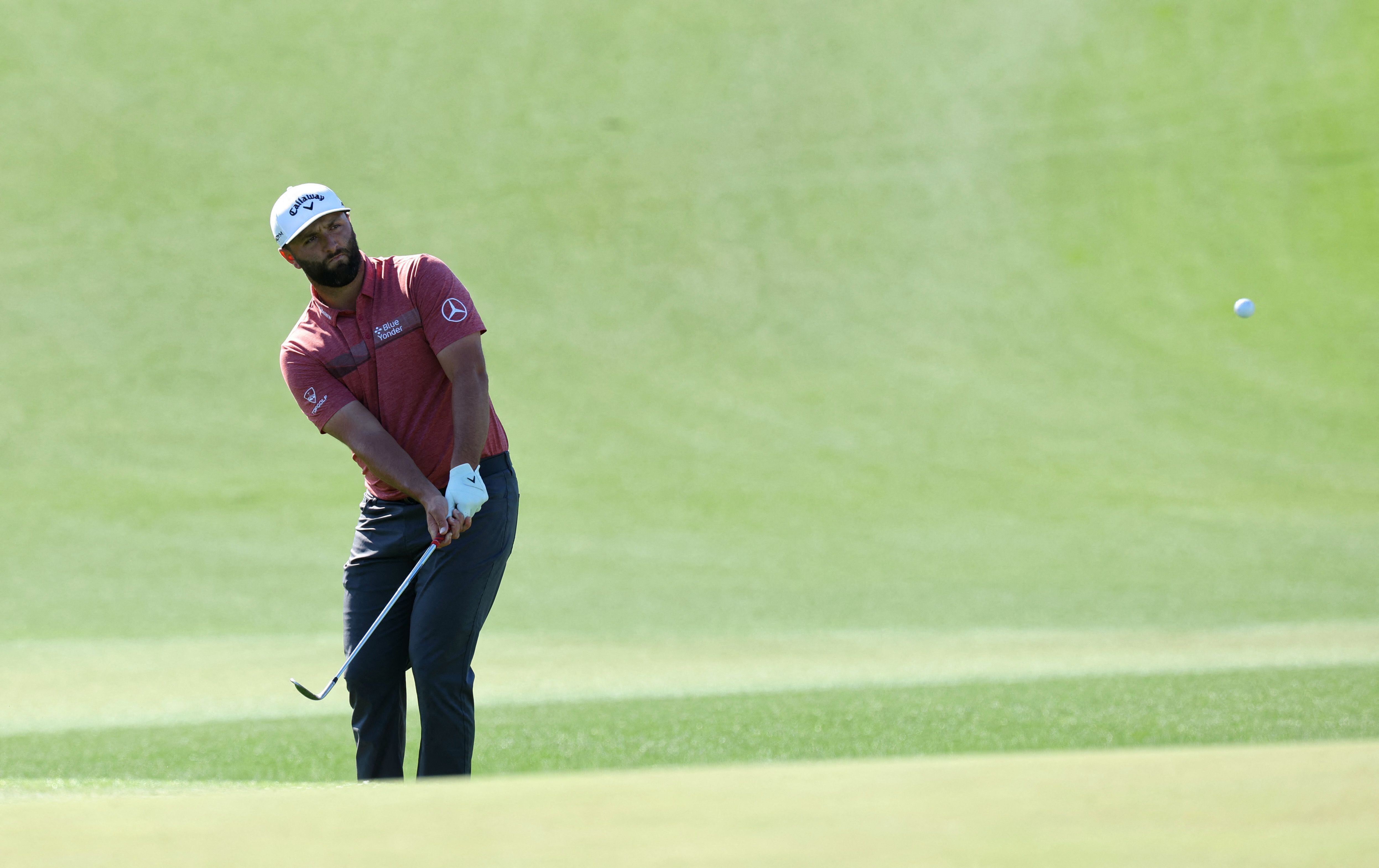 Golf - The Masters - Augusta National Golf Club - Augusta, Georgia, U.S. - April 9, 2023 Spain's Jon Rahm chips onto the 9th green during the final round REUTERS/Mike Segar