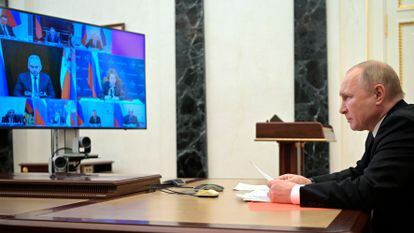 Russian President Vladimir Putin chairs a Security Council meeting in Moscow, Russia, Friday, Jan. 21, 2022. (Alexei Nikolsky, Sputnik, Kremlin Pool Photo via AP)