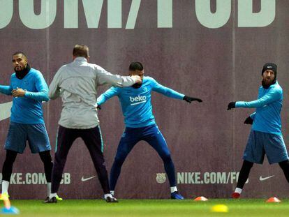 Boateng, Murillo y Messi en el entrenamiento de este martes. 