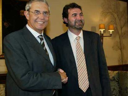 Emilio Pérez Touriño, a la izquierda, y Anxo Quintana, en la reunión de ayer en Santiago de Compostela.