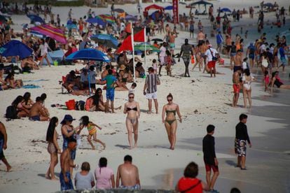 Tourists on a Cancun beach last week.