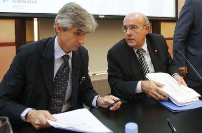 Josep Maria Argimon, cuando era director del AQuAS, y el entonces consejero de Salud, Boi Ruiz, en un acto en 2015
