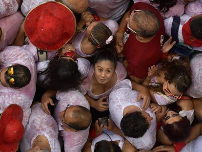 Revellers pack the main square during the launch of the 'Chupinazo' rocket, to celebrate the official opening of the 2018 San Fermin fiestas with daily bull runs, bullfights, music and dancing in Pamplona, Spain, Friday July 6, 2018. (AP Photo/Alvaro Barrientos)