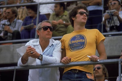 Paul Newman and his son Scott follow a car race in 1972. The actor's eldest son died in November 1978, aged 28, of an overdose. 