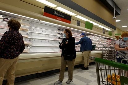 Empty shelves in the butcher section of a Miami supermarket on January 11.