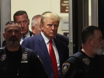 El expresidente de EE UU Donald Trump llega a los juzgados de lo penal de Manhattan, este martes.