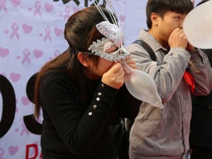Acto de prevención del sida en China.