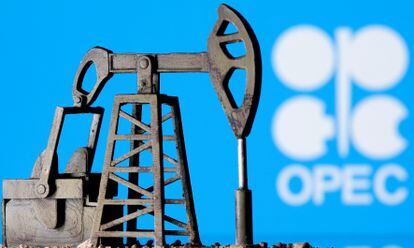 Recreation of an oil pump, with the OPEC logo in the background.