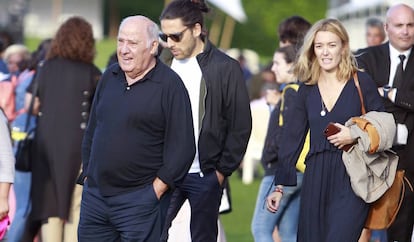 Amancio Ortega, con su hija Marta.