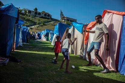 Children play in the Devirel refugee camp in Los Cayos in February this year.