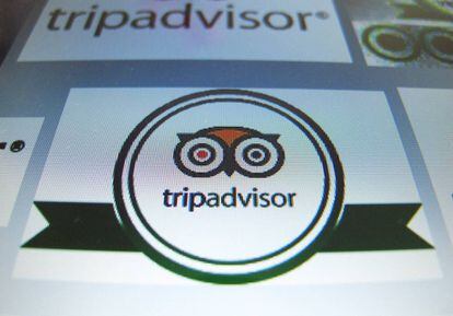 Logo de TripAdvisor en la pantalla de un ordenador.
