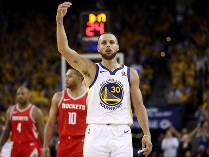 Curry celebra una de sus canastas ante Houston.