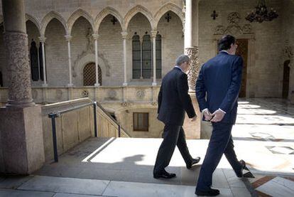 José Montilla (a la izquierda) y Mariano Rajoy, en el Palau de la Generalitat.