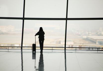 A passenger at an airport.  