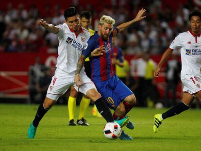 Matias Kranevitter y Leo Messi durante el partido de ida.