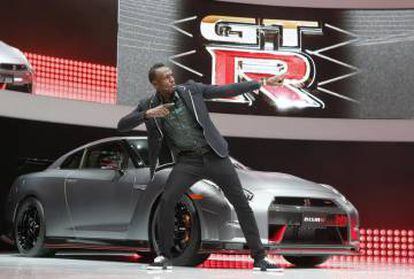 El atleta Usain Bolt, en 2013, presentando el Nissan GT-R Nismo.