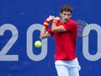 Pablo Carreno Busta, of Spain, returns to Karen Khachanov, of the Russian Olympic Committee, during the semifinal round of the men's tennis competition at the 2020 Summer Olympics, Friday, July 30, 2021, in Tokyo, Japan. (AP Photo/Patrick Semansky)