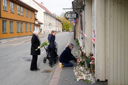 Flowers are left by several people on Monday in front of the studio and home of artist Hanne Englund, one of Kongsberg's victims.