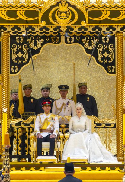 Abdul Mateen and Anisha Isa Kalebic, during the ceremony that makes their marriage official in Brunei, on Sunday.