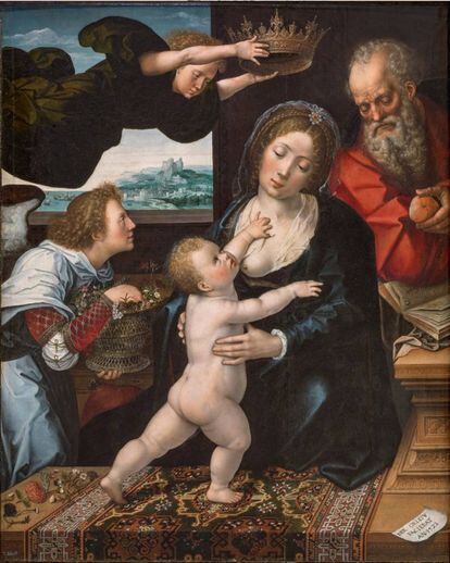 Un ángel ofrece a la Virgen un cesto de flores, alusivo a la Pasión en 'La Sagrada Familia' de Bernard van Orley. |
