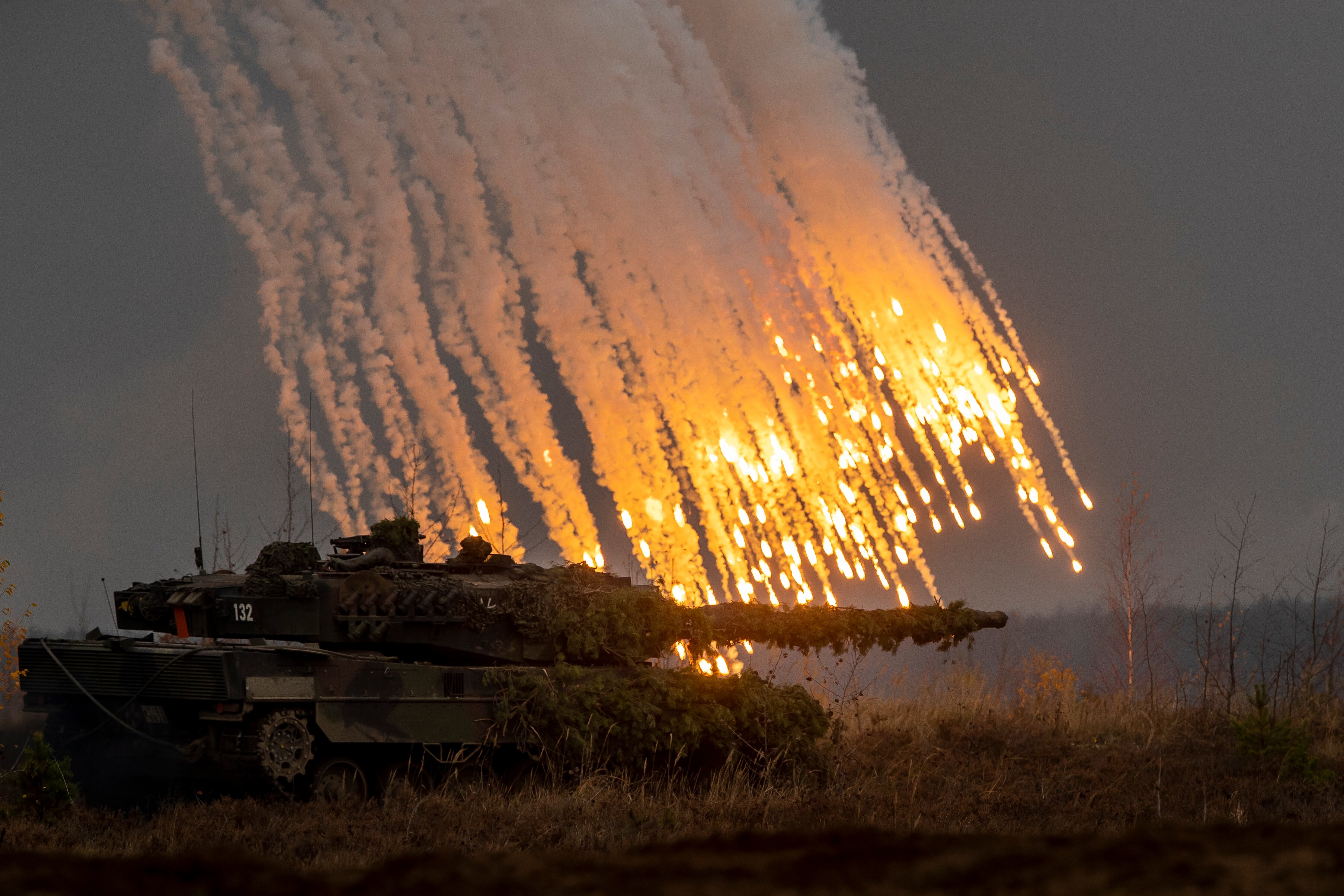 Germany army Main battle tank Leopard 2A6 take part in the NATO military exercise 'Iron Wolf 2022-II' at a training range in Pabrade, north of the capital Vilnius, Lithuania on Wednesday, Oct. 26, 2022. The multinational exercise 'Iron Wolf 2022-II' will train roughly 3,500 soldiers. (AP Photo/Mindaugas Kulbis)