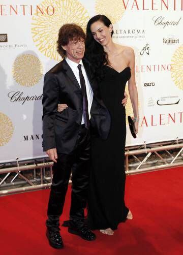 Mick Jagger con la diseñadora L'Wren Scott en 2007. La pareja empezó a salir en 2001 y estuvieron juntos hasta que ella se suicidó, en 2014.