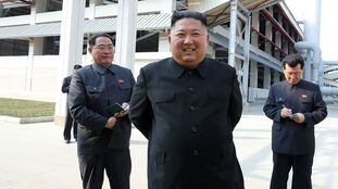 This picture taken on May 1, 2020 and released from North Korea's official Korean Central News Agency (KCNA) on May 2, 2020 shows North Korean leader Kim Jong Un (2nd L) visiting the completed Suchon phosphate fertilizer factory in South Pyongan Province, North Korea. (Photo by STR / KCNA VIA KNS / AFP) / - South Korea OUT / ---EDITORS NOTE--- RESTRICTED TO EDITORIAL USE - MANDATORY CREDIT "AFP PHOTO/KCNA VIA KNS" - NO MARKETING NO ADVERTISING CAMPAIGNS - DISTRIBUTED AS A SERVICE TO CLIENTS / THIS PICTURE WAS MADE AVAILABLE BY A THIRD PARTY. AFP CAN NOT INDEPENDENTLY VERIFY THE AUTHENTICITY, LOCATION, DATE AND CONTENT OF THIS IMAGE --- / 