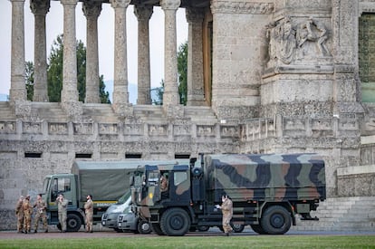 Italian military trucks and soldiers are seen by Bergamo's cemetery after the army were deployed to move coffins from the cemetery to neighbouring provinces, after the cemetery was overwhelmed by the scale of the coronavirus disease (COVID-19) outbreak, in Bergamo, Italy, March 18, 2020. Picture taken March 18, 2020. Sergio Agazzi.Fotogramma via REUTERS ATTENTION EDITORS - ITALY OUT. NO COMMERCIAL OR EDITORIAL SALES IN ITALY AND .IT WEBSITES. THIS IMAGE HAS BEEN SUPPLIED BY A THIRD PARTY. MANDATORY CREDIT.