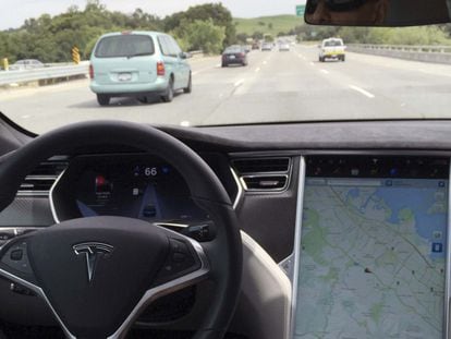 The interior of a Tesla Model S is shown in autopilot mode in San Francisco, California, U.S., April 7, 2016.   REUTERS/Alexandria Sage/File Photo