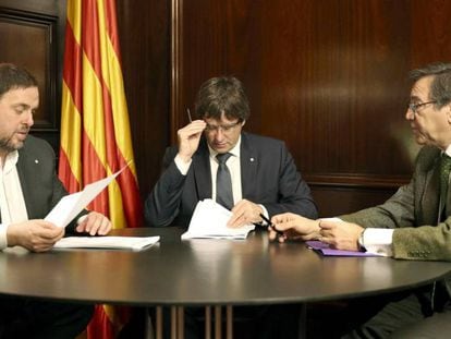 Junqueras, Puigdemont y un secretario del Tribunal Superior de Cataluña.