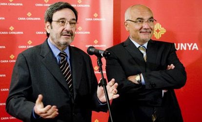 Los expresidentes de CatalunyaCaixa, Narc&iacute;s Serra y Adolf Tod&oacute;, tras una asamblea de 2010.