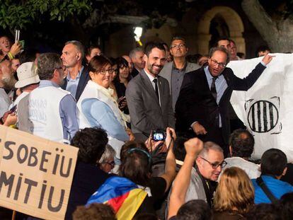 El presidente de la Generalitat, Quim Torra, y el presidente del Parlament, Roger Torrent, durante la marcha soberanista 