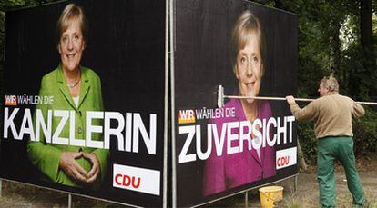 Con la imagen de Angela Merkel, el cartel de propaganda electoral incluye el eslogan: "Nosotros votamos a la canciller".