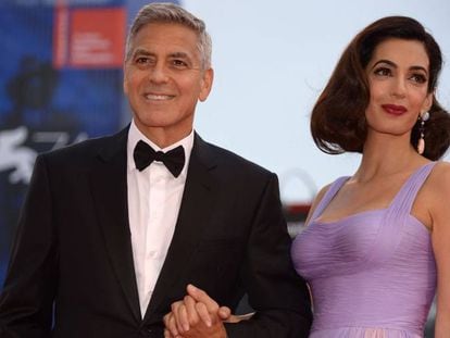 El actor George Clooney y su esposa la abogada Amal Clooney en el Festival de Cine de Venecia el 2 de septiembre. 
