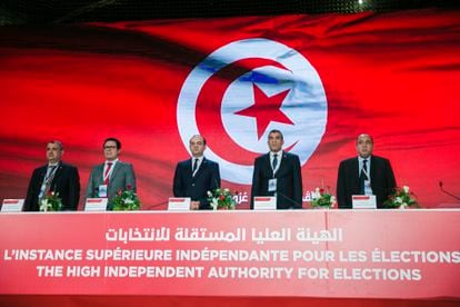 Members of the electoral board announce the result of the constitutional referendum, Tuesday in Tunisia.