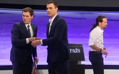 Rivera, Sánchez e Iglesias, durante el debate organizado por EL PAÍS