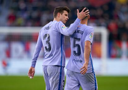 Piqué y Busquets, después de un encuentro ante Osasuna esta temporada.