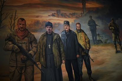 The well-known opera singer Vasil Slipak (left), who was shot dead in 2016 while fighting in Donbas, is depicted in one of the frescoes in the Saint Theodosius monastery in kyiv.