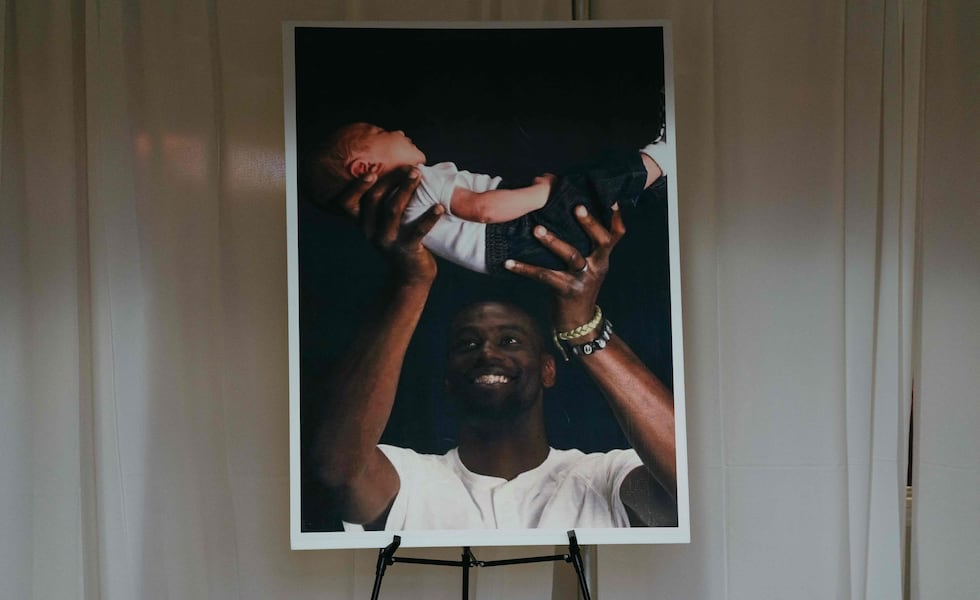 MEMPHIS, TN - FEBRUARY 01: A photograph of Tyre Nichols holding his child sits in the foyer of Mississippi Boulevard Christian Church on February 1, 2023 in Memphis, Tennessee. On January 7th, 29-year-old Nichols was violently beaten for three minutes by Memphis police officers at a traffic stop and died of his injuries. Five Black Memphis Police officers have been fired after an internal investigation found them to be directly responsible for the beating and have been charged with second-degree murder, aggravated assault, two charges of aggravated kidnapping, two charges of official misconduct and one charge of official oppression.   Lucy Garrett/Getty Images/AFP (Photo by Lucy Garrett / GETTY IMAGES NORTH AMERICA / Getty Images via AFP)