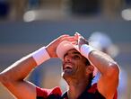 Spain's Pablo Andujar celebrates after winning against Austria's Dominic Thiem during their men's singles first round tennis match on Day 1 of The Roland Garros 2021 French Open tennis tournament in Paris on May 30, 2021. (Photo by MARTIN BUREAU / AFP)