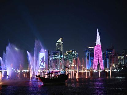 This picture taken from Doha's Corniche promenade shows a nightshot of the city on November 20, 2022, during the opening day of the Qatar 2022 World Cup football tournament. (Photo by Anne-Christine POUJOULAT / AFP)