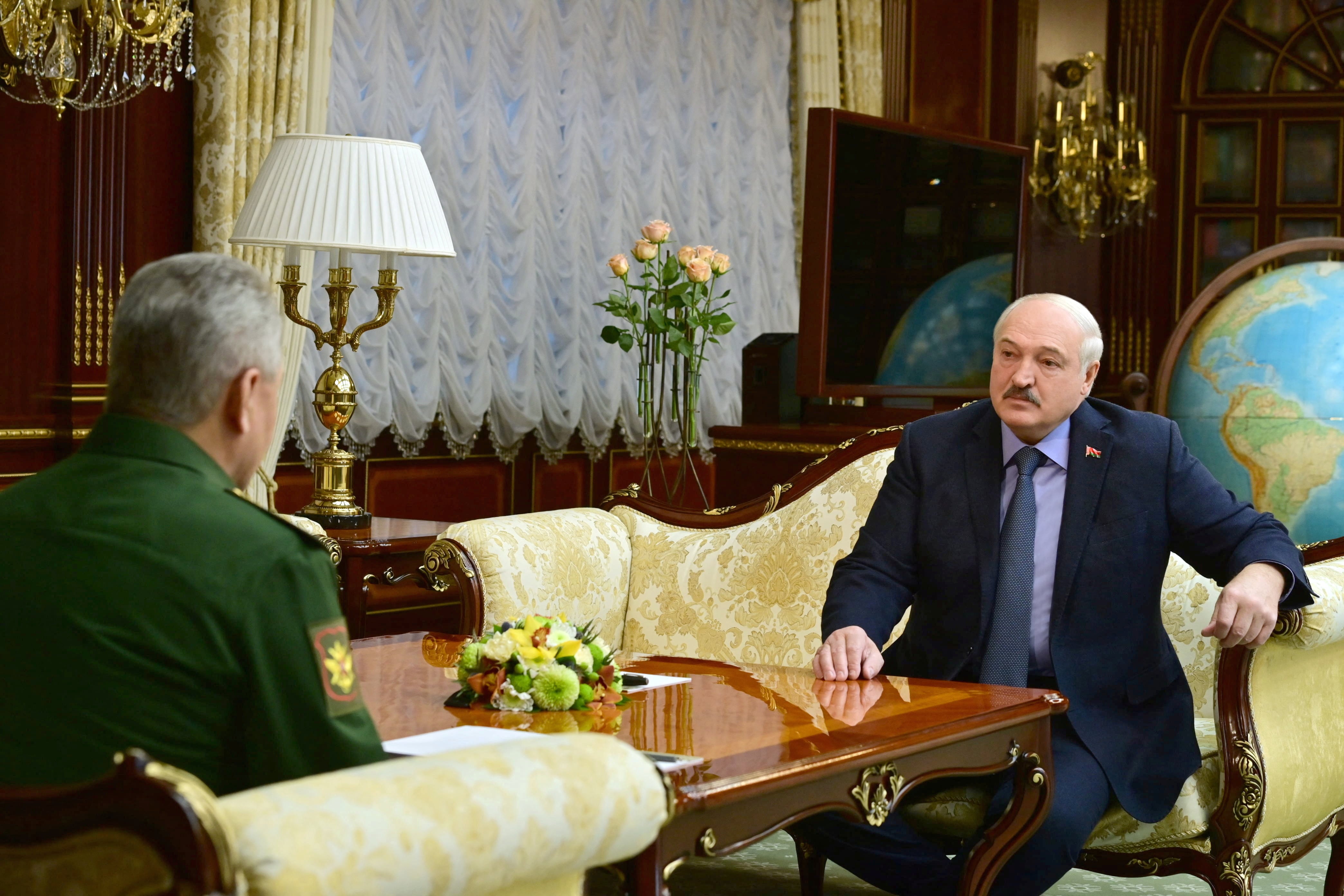 Belarusian President Alexander Lukashenko meets with Russian Defence Minister Sergei Shoigu in Minsk, Belarus April 10, 2023. BelTA/Handout via REUTERS  ATTENTION EDITORS - THIS IMAGE WAS PROVIDED BY A THIRD PARTY. NO RESALES. NO ARCHIVES. MANDATORY CREDIT.