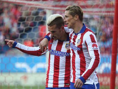 Griezmann y Torres celebran el segundo gol del Atlético.