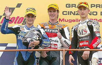 Pedrosa, Porto y Poggiali sonríen en el podio de 255 cc.