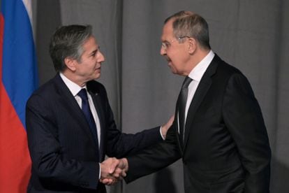US Secretary of State Antony Blinken, left, greets his Russian counterpart, Sergey Lavrov, during their meeting in Stockholm.