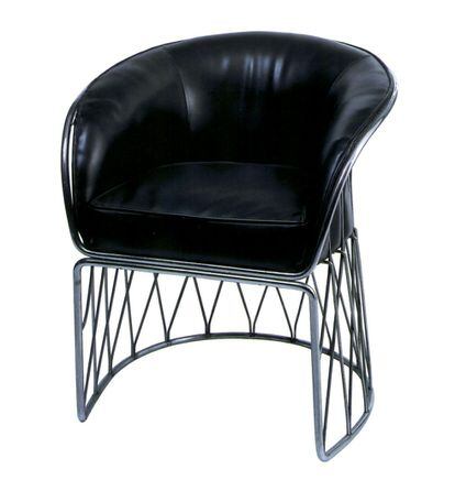 Una silla equipal hecha a base de cuero y acero inoxidable, diseñada por el mexicano Pedro Ramírez Vázquez en 1964.