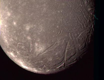 Surface of Ariel, one of the moons of Uranus, photographed by 'Voyager 2'.